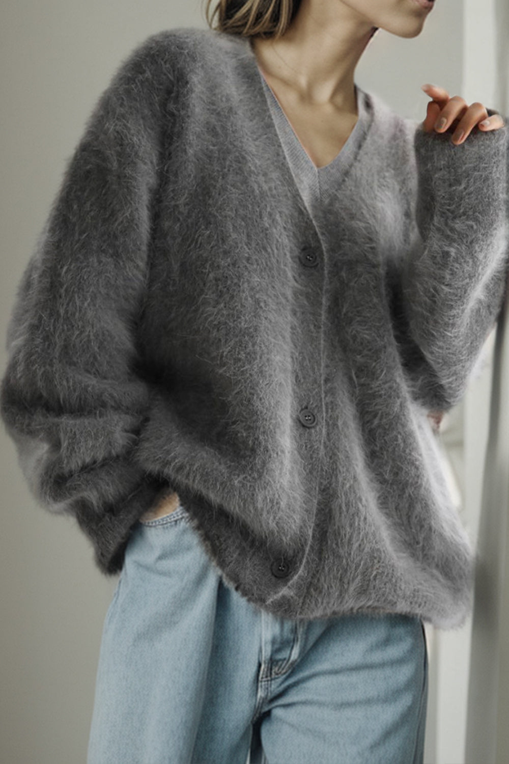 Dropped shoulder cardigan with button-up front in gray, featuring a slightly stretchy, polyamide material.