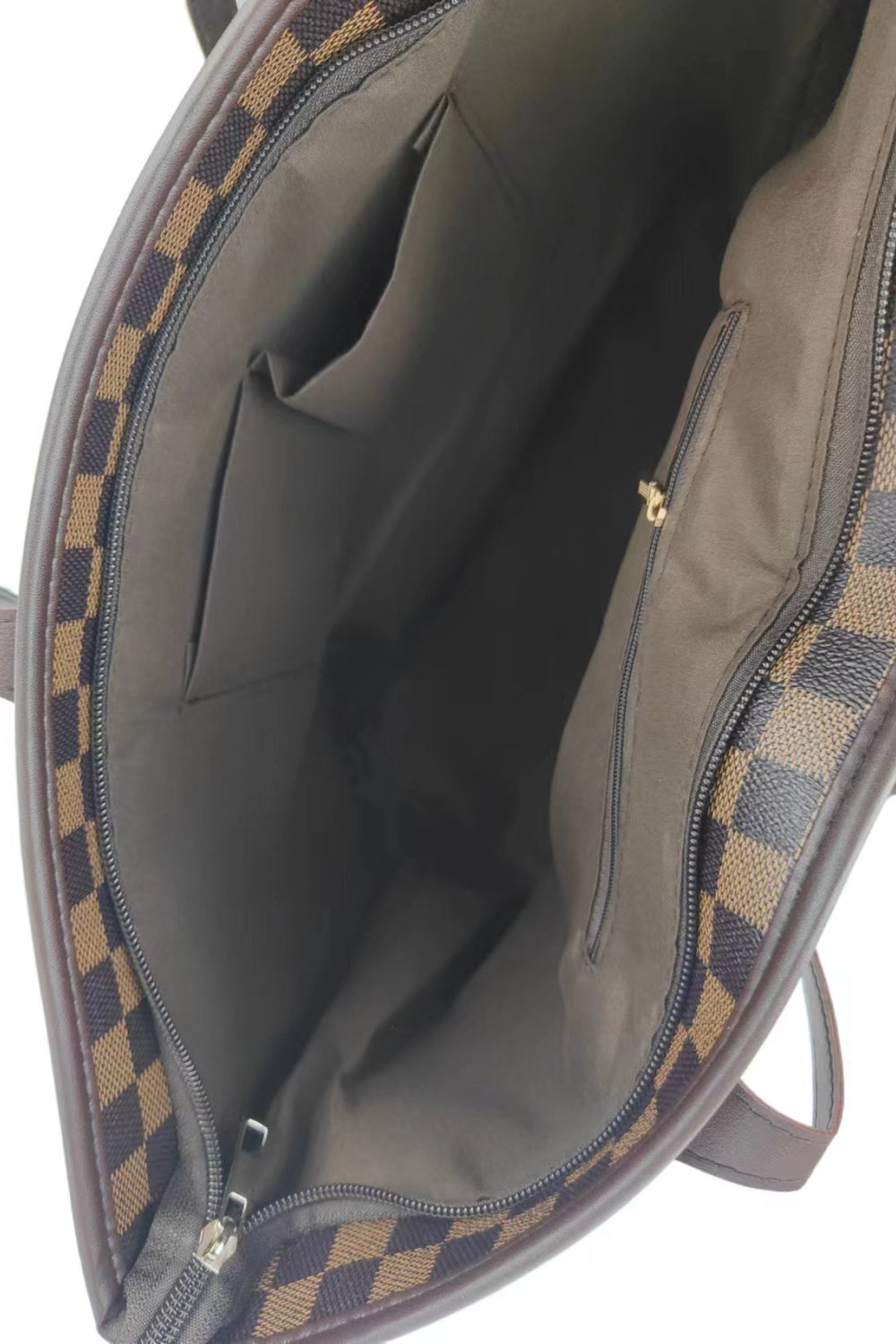 Checkered PVC two-piece bag set with large tote and small pouch.