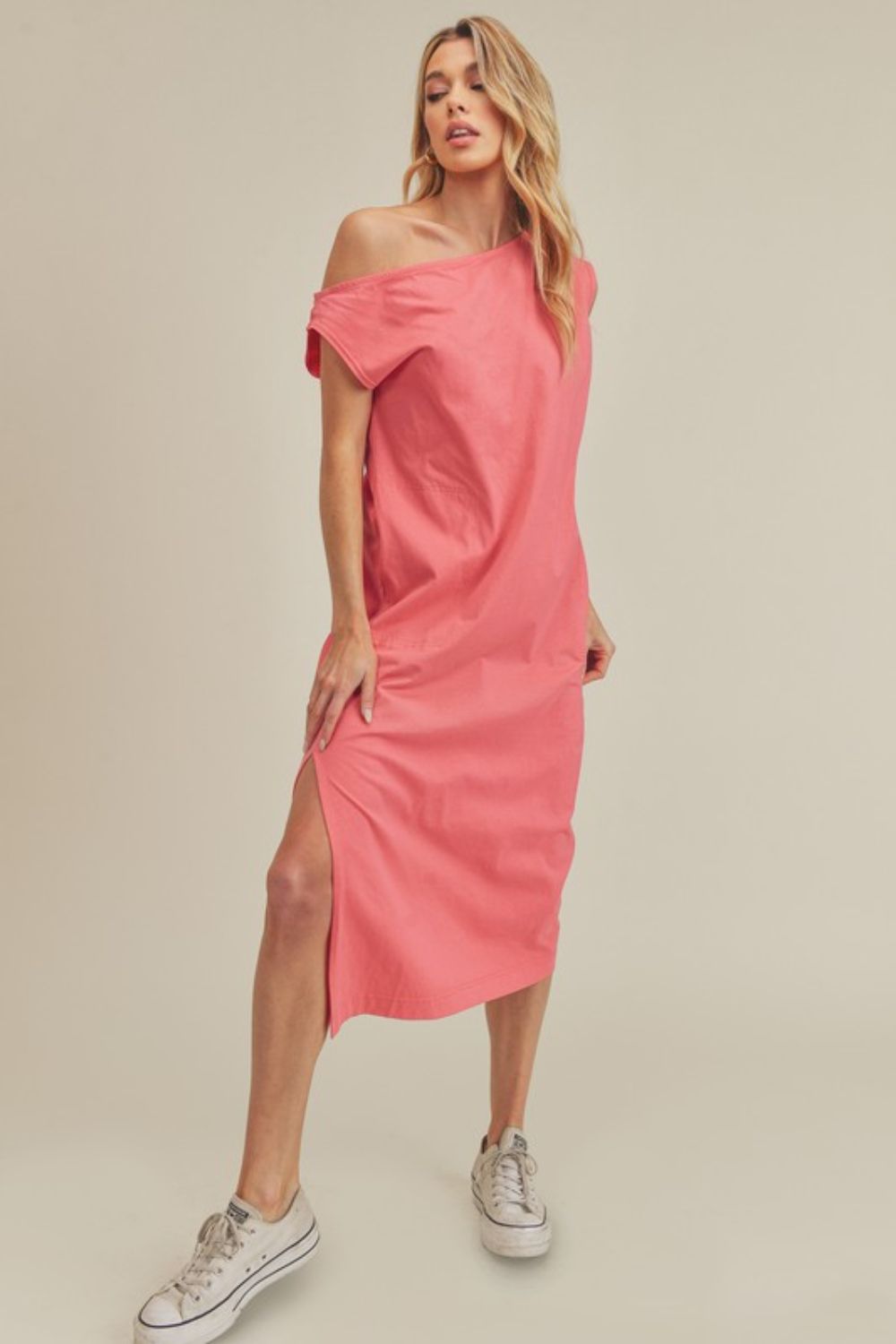 Aemi + Co Side Slit Round Neck Sleeveless Midi Dress in pink with modern side slits.
